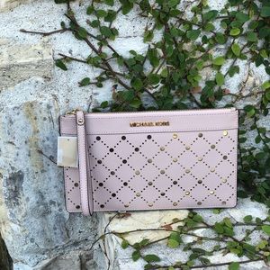 NWT Michael Kors XL Zip perforated Clutch pink